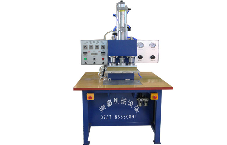 服裝壓花機圖片